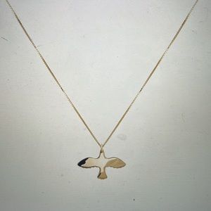 Brand new Emma Israelsson golden small dove necklace